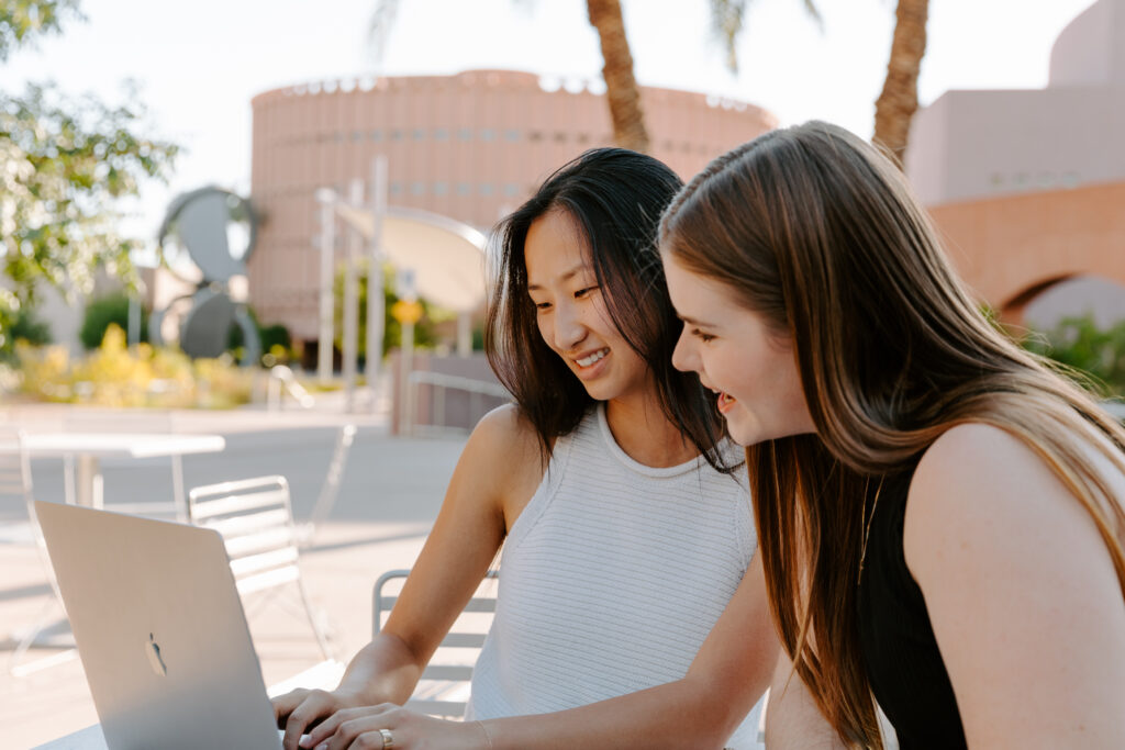 Two female creative entrepreneurs collaborating.